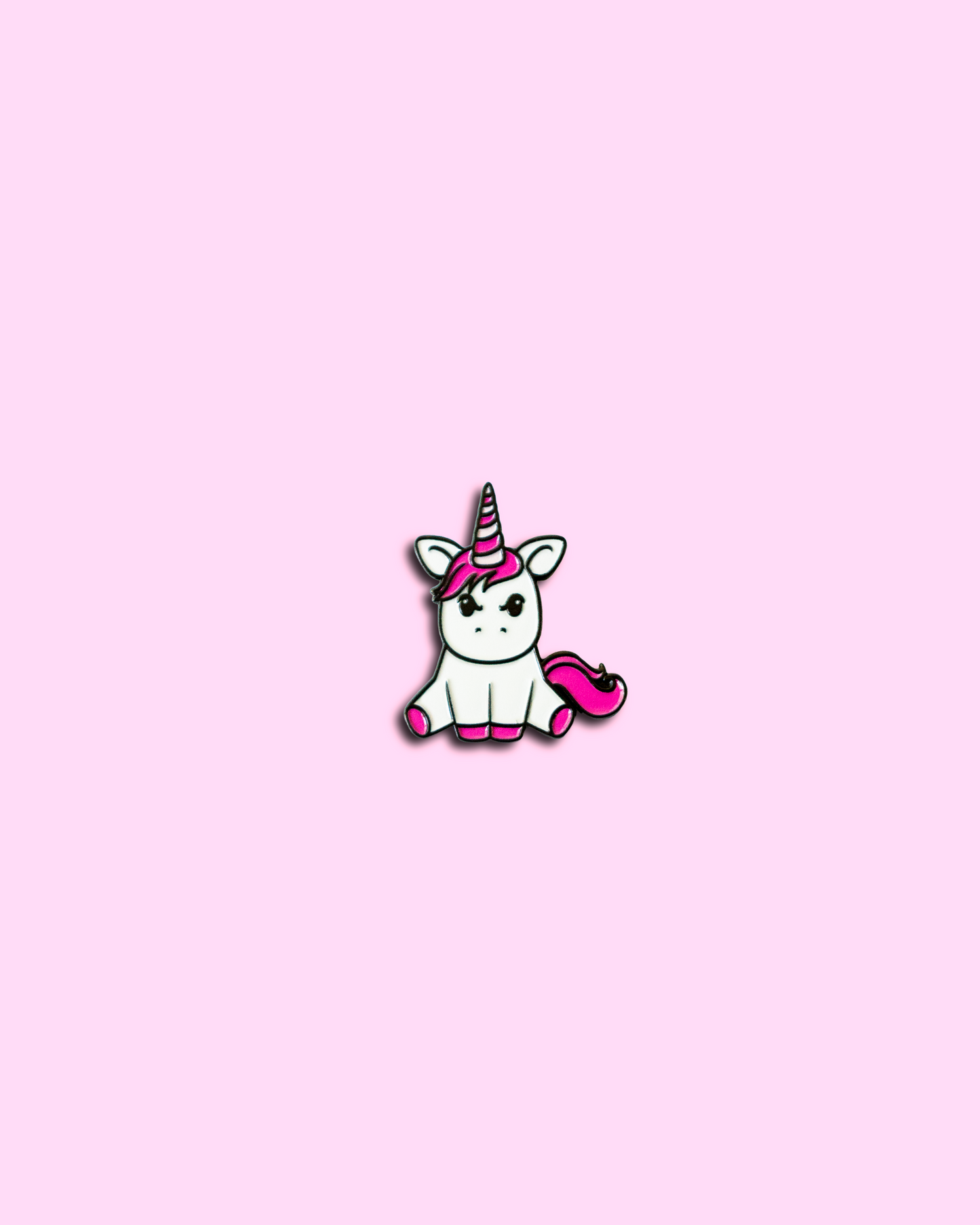 Unicorn Hunters Club 1.25 inch soft enamel Grumpy Unicorn pin in white and hot pink