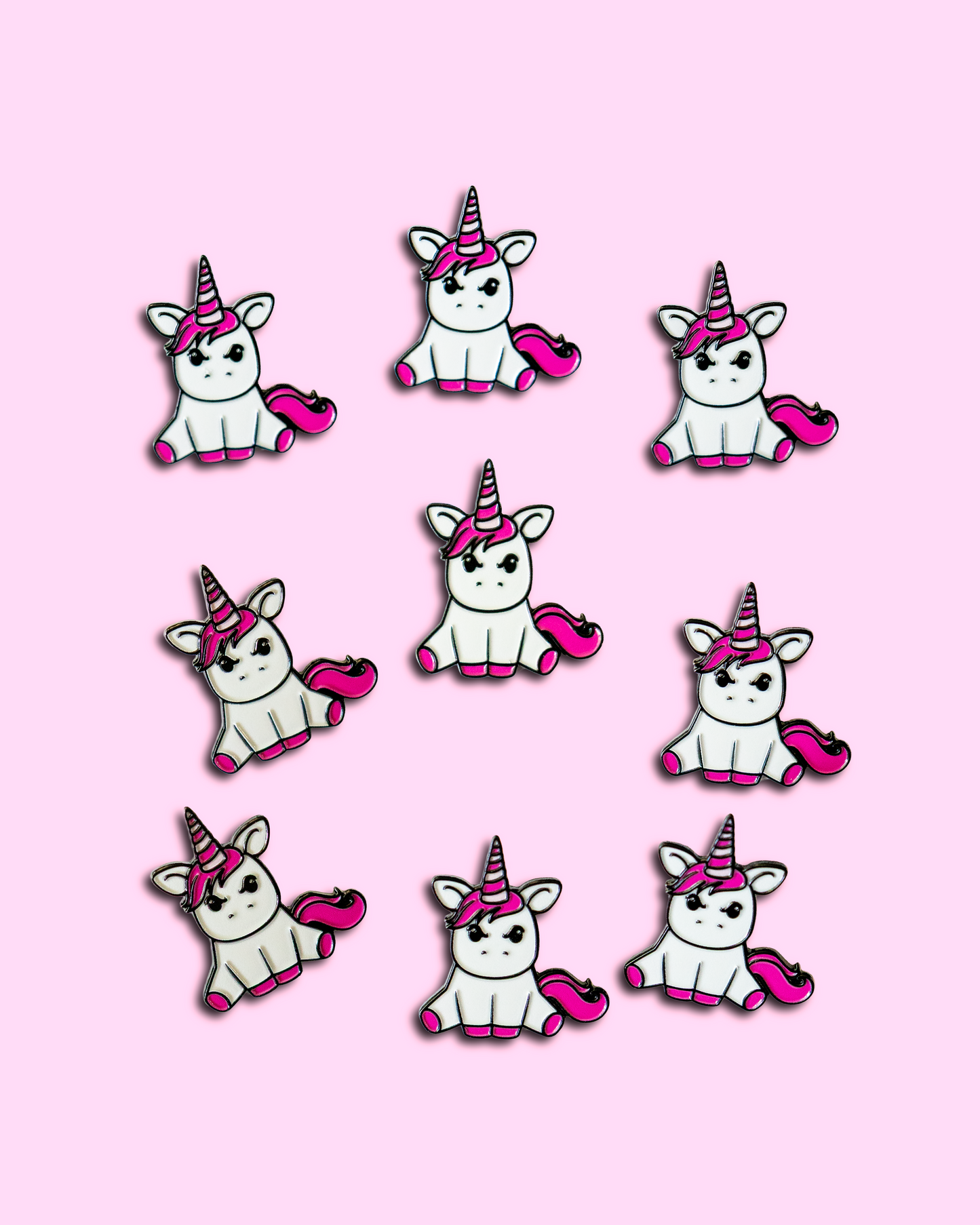 Nine Unicorn Hunters Club Grumpy Unicorn soft enamel pins arranged in a grid
